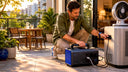 Man connecting portable power station on home porch