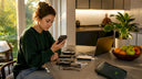 Woman examining power bank and devices