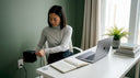 Woman connecting indoor portable power station