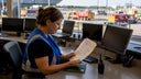 Engineer reviewing emergency response plan at control console